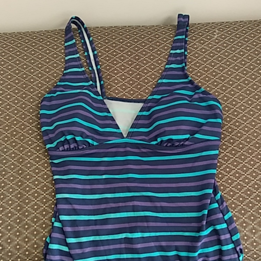 One piece swimsuit.
